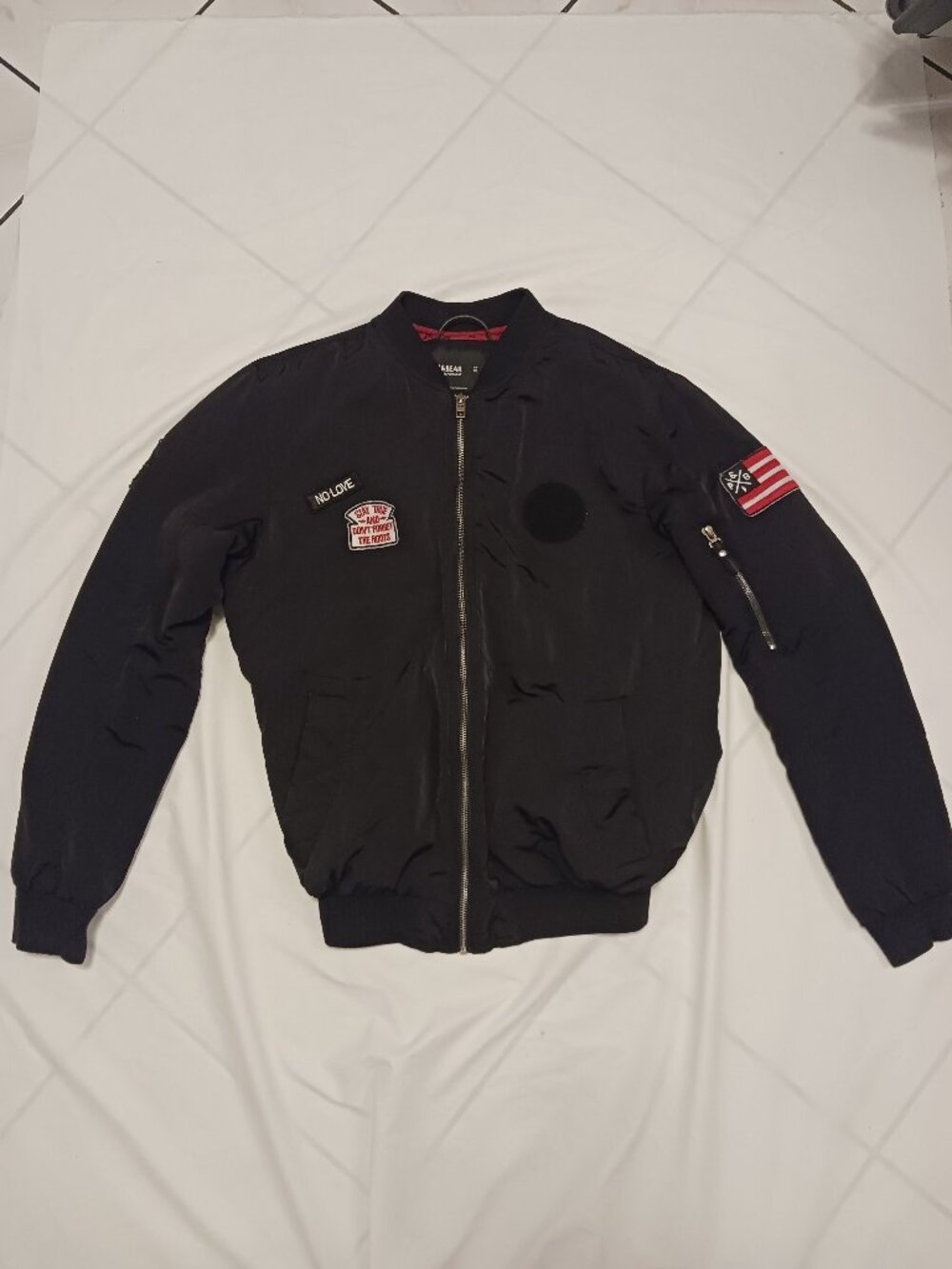 Black Pull&Bear bomber jacket features embroidered chest patches